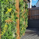 Artificial Living Wall Panel with Variegated Mixed Green, Yellow, Red Foliage & White Flowers Decor Pure Clean Rental Solutions 